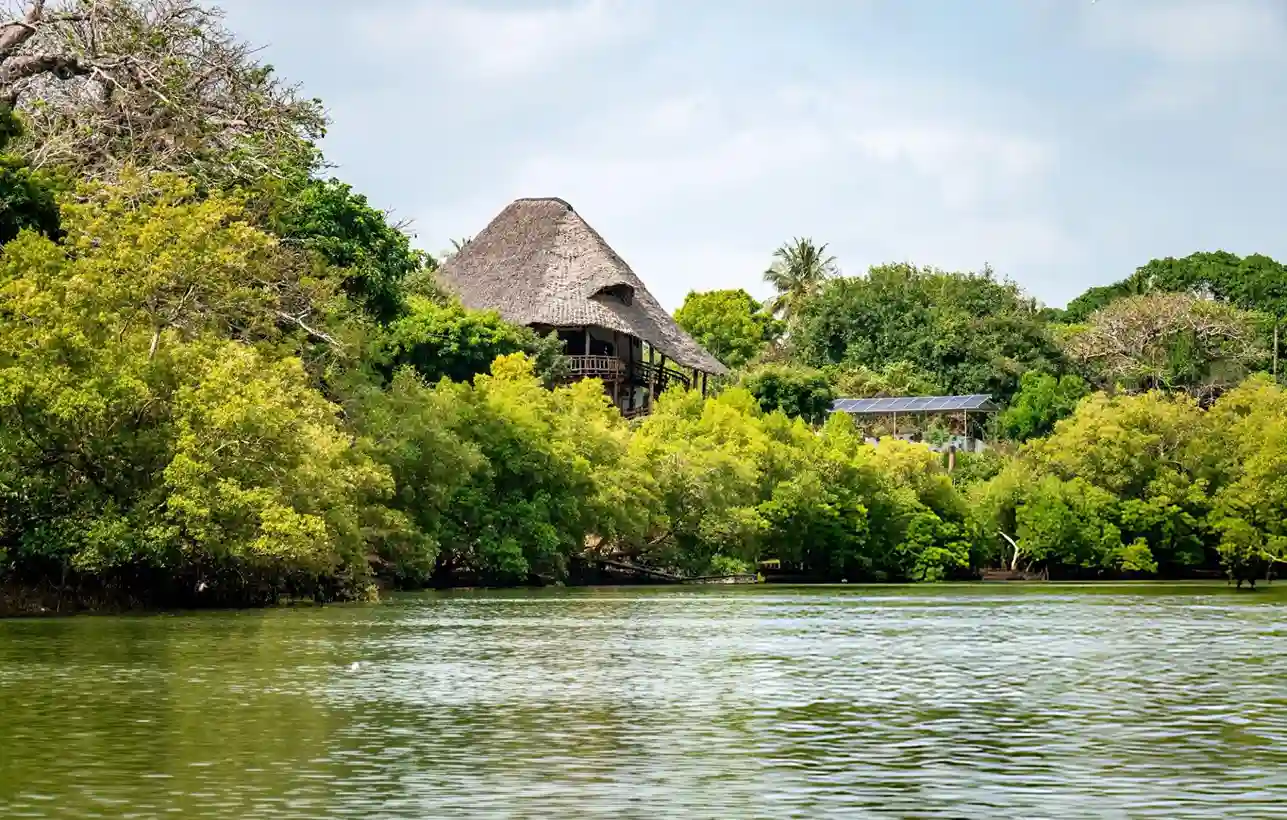 Luxury safari lodge by river in Kenya